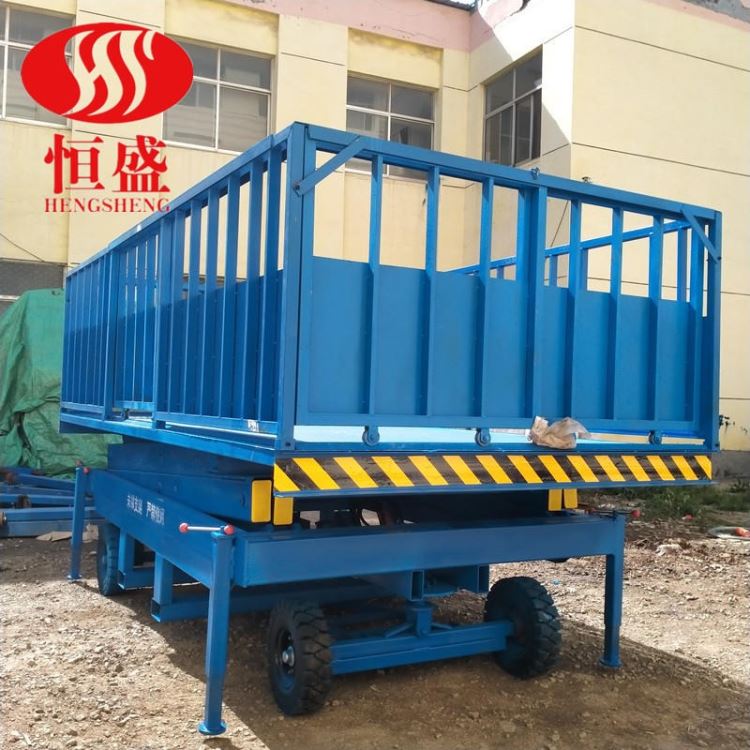 恒盛移动卸猪台定制 广元养殖场卖猪升降台 上下猪移动装猪台 卖猪中转台XZT_移动工作灯_室外灯具_工业照明_供应_工品联盟网