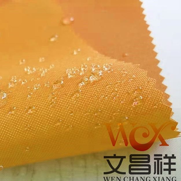 pvc涂层布厂家 涤纶面料防水牛津布箱包户外帐篷车棚雨衣pvc涂层布 文昌祥批发_雨衣_身体防护_个人防护_供应_工品联盟网